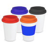 A collection of four reusable coffee cups in white, featuring coloured lids and grips in red, purple, orange, and black.
