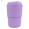 A reusable coffee cup in a light purple shade with a ribbed base and a silicone lid, featuring a logo.