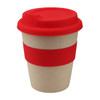 A reusable coffee cup featuring a beige body, red silicone band, and a red lid, with a logo on the surface.