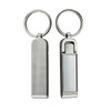 A silver mobile stand and hanger key ring with a textured side and a smooth side, featuring a metal keyring.