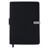 A black premium notebook with a sleek design, featuring a logo and an elastic closure band.