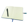 A blue notebook with lined pages, accompanied by a black pen and a small USB attachment.