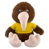 A brown kiwi plush toy with a beige beak, wearing a yellow shirt. It has large, friendly eyes and soft, pink feet.