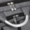 A grey laptop backpack with dual zippers and a silver handle. It has a textured fabric and features branding.