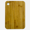 A large bamboo cutting board with a round hole in one corner, featuring a natural light brown finish.