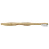 A bamboo toothbrush with a curved handle and white bristles, featuring a logo on the handle.