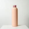 A drink bottle in a soft pink hue with a matte finish and a contrasting pink lid. It features a logo.