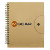 A spiral-bound notebook with a brown cover and a button closure, featuring a logo on the front.
