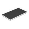 A small Reflex Notebook with a black cover and white edges, featuring a branding logo on the front.