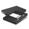 A black gift box containing a dark grey notebook and a silver pen. The notebook includes a section for notes.
