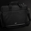 A black laptop bag with dual handles, an adjustable strap, and a logo on the front.