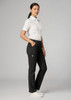 A model wearing black women's comfort waist cargo pants with a white shirt and sneakers, featuring pockets and a logo.