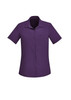 A plain short sleeve shirt in a rich purple colour, featuring a button-down front and a chest pocket.
