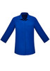 A blue women's button-up shirt with 3/4 sleeves and a pocket on the front. It features a brand logo.