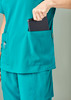 A teal scrub top featuring two pockets, with a hand placing a tablet into one of them.