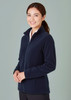 A women's plain micro fleece jacket in navy blue, featuring a zip front and a high collar, displayed on a model.