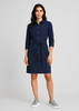 A navy blue women's dress with a button-up front, a tie belt at the waist, and two chest pockets.