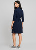 A navy blue dress with a belted waist and long sleeves, featuring a back view and side slits.