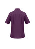A short-sleeved purple overblouse with a collar and subtle seam detailing, featuring a logo.