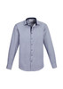 A long sleeve button-up shirt in a blue and white pattern, featuring a contrasting collar and cuffs, with a logo.