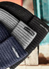 Three Unisex Streetworx Beanies in navy, grey, and black, featuring a logo on the band.