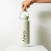A drink bottle in a pale green colour, featuring a handle and a logo on the front.