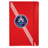 A red journal with a textured cover and an emblem in the centre, featuring stripes and a logo.