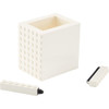 A white pen pot with a textured surface, accompanied by two white pens.