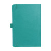A teal journal with a soft cover, featuring an elastic closure and branding.