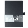 A black notebook with blank pages and a belly band for customisation. It has an elastic closure.