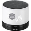 A cylindrical Bluetooth speaker in white and black, featuring a textured top and a branding logo.