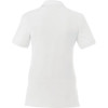 A white women's polo shirt with short sleeves and a collar. The design features minimal detailing and includes a logo.