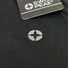 A black T-shirt featuring a small logo. Includes a tag with branding from Swiss Peak.