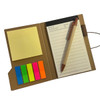 A sticky note pad in a brown cover with yellow, pink, green, and blue sticky flags and a pen.
