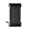 A black solar power bank with a textured surface, featuring solar panels and a leather strap. It has a logo.