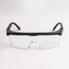 Anti-fog retractable goggles with a black frame and clear lenses, featuring a logo on the side.