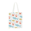 A white cotton bag featuring a playful aquatic pattern with fish, crabs, and bubbles. It has long handles and a logo.