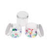 A set of three clear round containers with aluminium lids, featuring colourful push pins inside two of them.