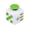 A white fidget cube with green buttons and a joystick, featuring various tactile surfaces and a logo.