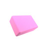 A pink EVA yoga block with a rectangular shape, featuring rounded edges and a smooth surface.