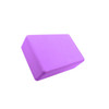A purple EVA yoga block with a rectangular shape, featuring rounded edges and a smooth surface.