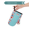 A neoprene oven mitt with a colourful design featuring kitchen-themed illustrations and a hanging loop.