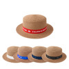 A straw hat in brown with a ribbon band, available in multiple designs and colours including red, white, blue, and black.
