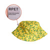 A yellow RPET bucket hat with a floral pattern and a label indicating it's made from recycled plastic bottles.