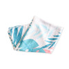 A silk chiffon scarf featuring a tropical design in shades of blue and pink with leafy patterns.