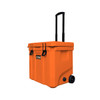 An orange cooler box with wheels and a telescoping handle, featuring a logo on the front.
