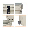 A light beige ice bucket featuring a secure latch, handle, and a faucet for easy dispensing. Includes a logo.