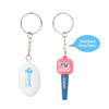 A custom-shaped PVC keyring featuring a rugby ball and a pink keychain with branding. Both are on metal keyrings.