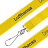 A bright yellow woven lanyard featuring a clip at one end and a logo. Suitable for exhibitions and events.