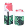 Two Christmas-themed stubby holders featuring a green tropical leaf design, each holding a can.